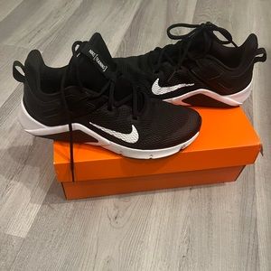 Nike legend essentials in black and white